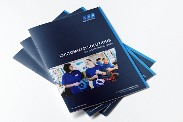 A stack of brochures about our EFB-Slovakia site