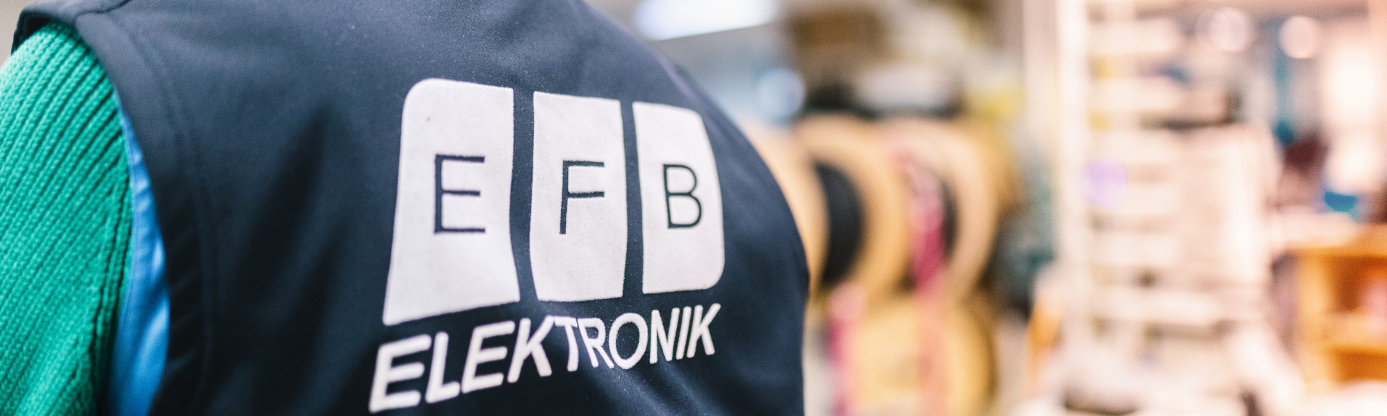 EFB-Elektronik Logo on work outfit, EFB-Elektronik