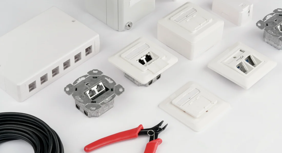 Network sockets and keystone inserts for surface mounting/flush mounting, cable reel, and installation tools for LAN installation.