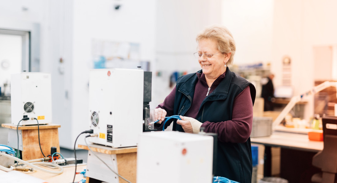 Woman assembling cable, EFB-Elektronik